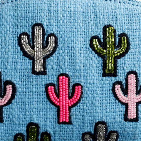 Colorful cactus patches on a blue background