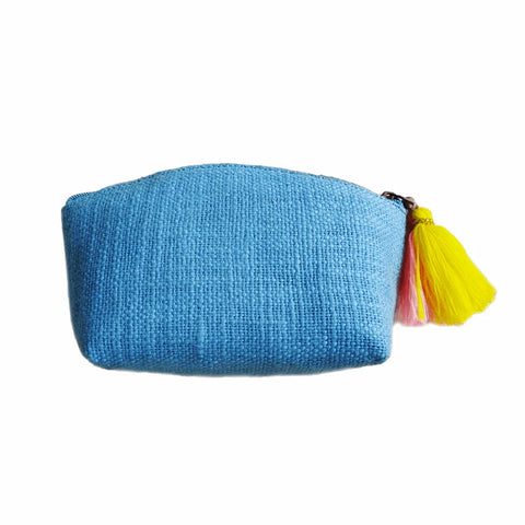 Blue pouch with colorful tassels on a white background