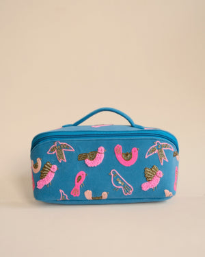 Alt Text: Handmade blue makeup pouch with pink and golden bird embroidery, stylish travel toiletry bag.