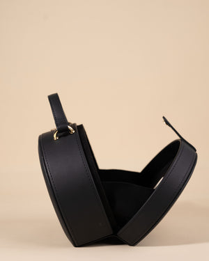 Stylish black box sling bag with intricate embroidery and gold fittings