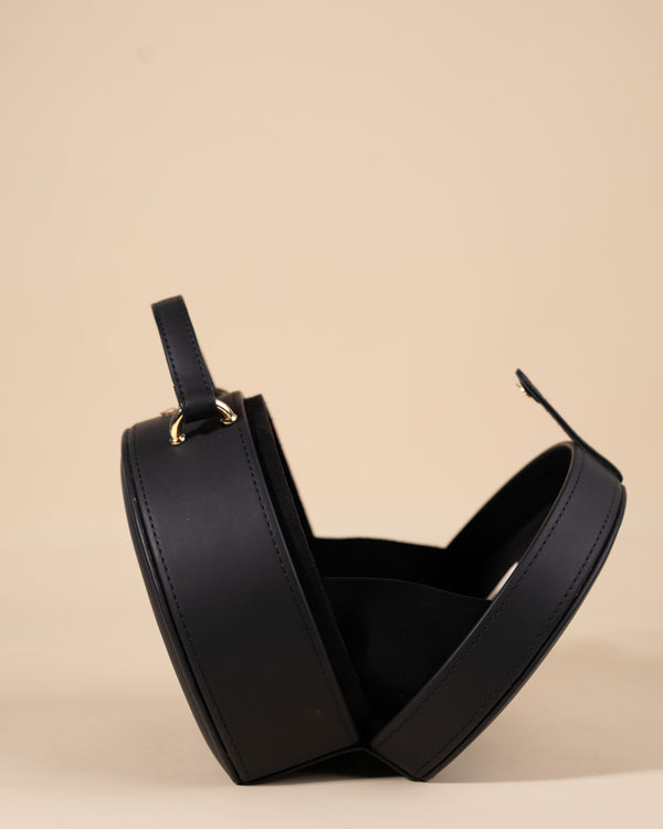 Stylish black box sling bag with intricate embroidery and gold fittings