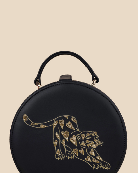  Handcrafted designer sling bag with intricate leopard embroidery