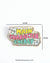 Colorful embroidered brooch with “Main Character Energy” text