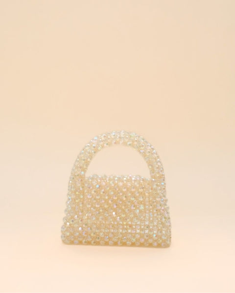 Compact rainbow bead handbag with shimmering finish, lightweight mini tote for women.