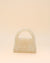 Compact rainbow bead handbag with shimmering finish, lightweight mini tote for women.