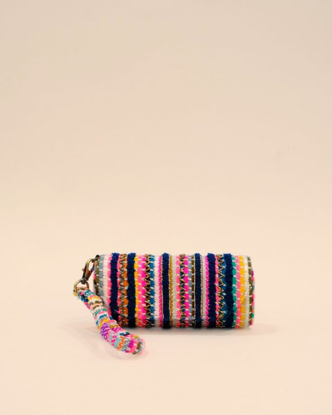 Handmade sunglass cover with colorful embroidered stripes in navy, pink, orange, yellow, and white, featuring a wrist strap.