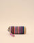 Handmade sunglass cover with colorful embroidered stripes in navy, pink, orange, yellow, and white, featuring a wrist strap.