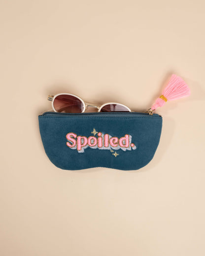 Teal sunglass cover with nakshi aari embroidery, neon tassel, and golden bead accents