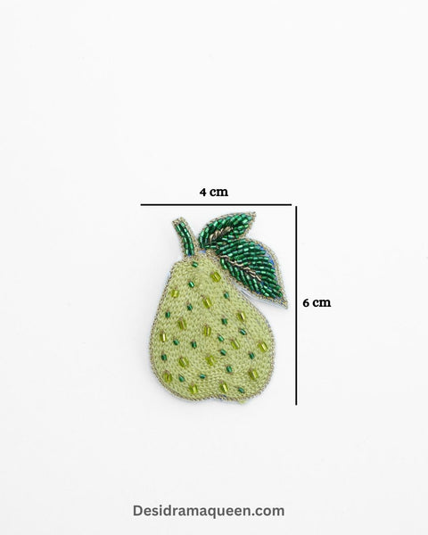 Handmade pear-shaped brooch with green embroidery and beads
