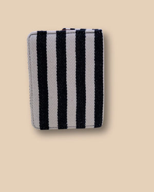 Personalized fabric passport cover featuring stripes and airplane motif.
