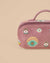 Handmade embroidered makeup pouch in dusty mauve with evil eye motifs, perfect for cosmetics and travel storage.
