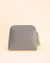 Grey makeup pouch decorated with lemon slices and flowers embroidery, handmade bag with yellow tassel zipper.