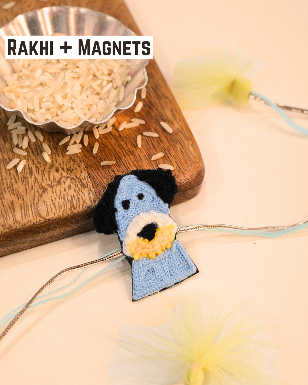 Beagle Dog embroidered rakhi magnet placed beside a bowl of rice, styled for a festive Raksha Bandhan celebration.