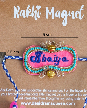 Close-up of Bhaiya embroidered rakhi magnet on display card, showcasing handcrafted design and reusable keepsake fridge magnet.