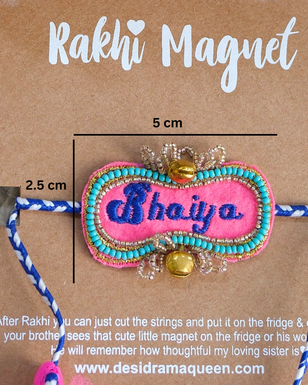 Close-up of Bhaiya embroidered rakhi magnet on display card, showcasing handcrafted design and reusable keepsake fridge magnet.