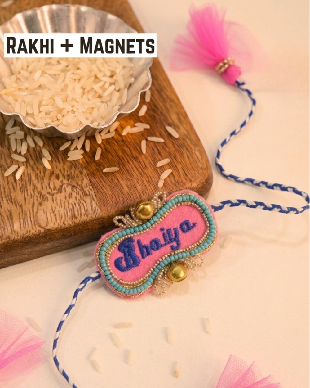 Bhaiya embroidered rakhi magnet placed beside a bowl of rice, styled for a festive Raksha Bandhan celebration.