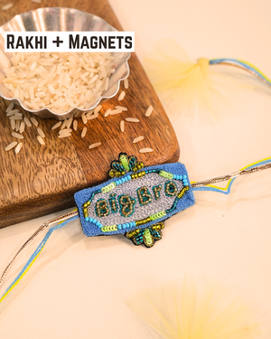 Big Bro embroidered rakhi with glitter lettering placed beside a bowl of rice for a festive Raksha Bandhan celebration.