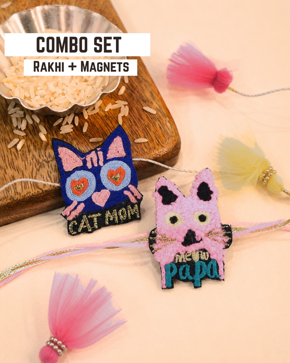 Cat Mom and Meow Papa embroidered combo rakhi magnets placed beside a bowl of rice for Raksha Bandhan celebrations.