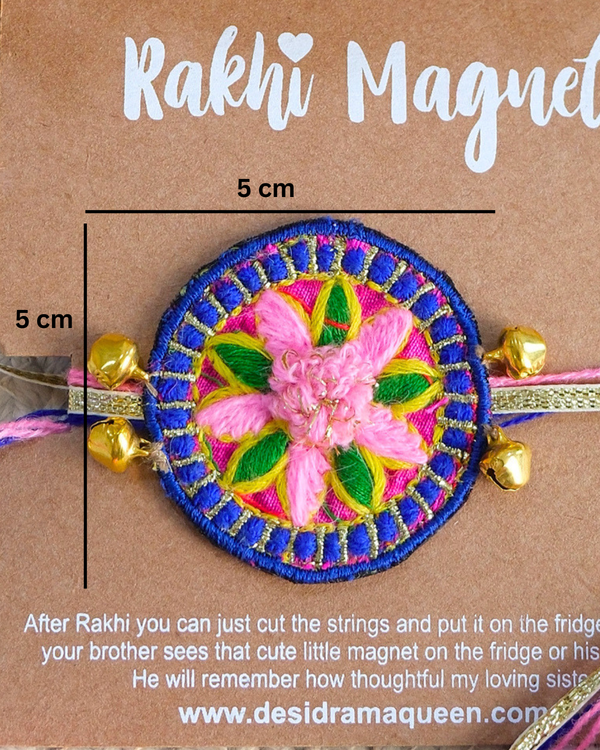 Packaged Gulabi Mandala Rakhi magnet on a wooden backdrop, highlighting a colorful handcrafted gift for celebrating Raksha Bandhan with love.
