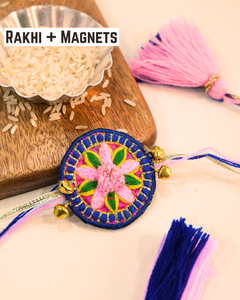 Handcrafted Gulabi Mandala Rakhi magnet displayed with colorful threads and tassels, adding a vibrant festive touch to Raksha Bandhan.