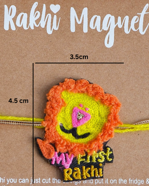 Close up of My First Rakhi lion cub embroidered magnet with colorful Rakhi thread, designed as a lasting fridge magnet keepsake for little ones.