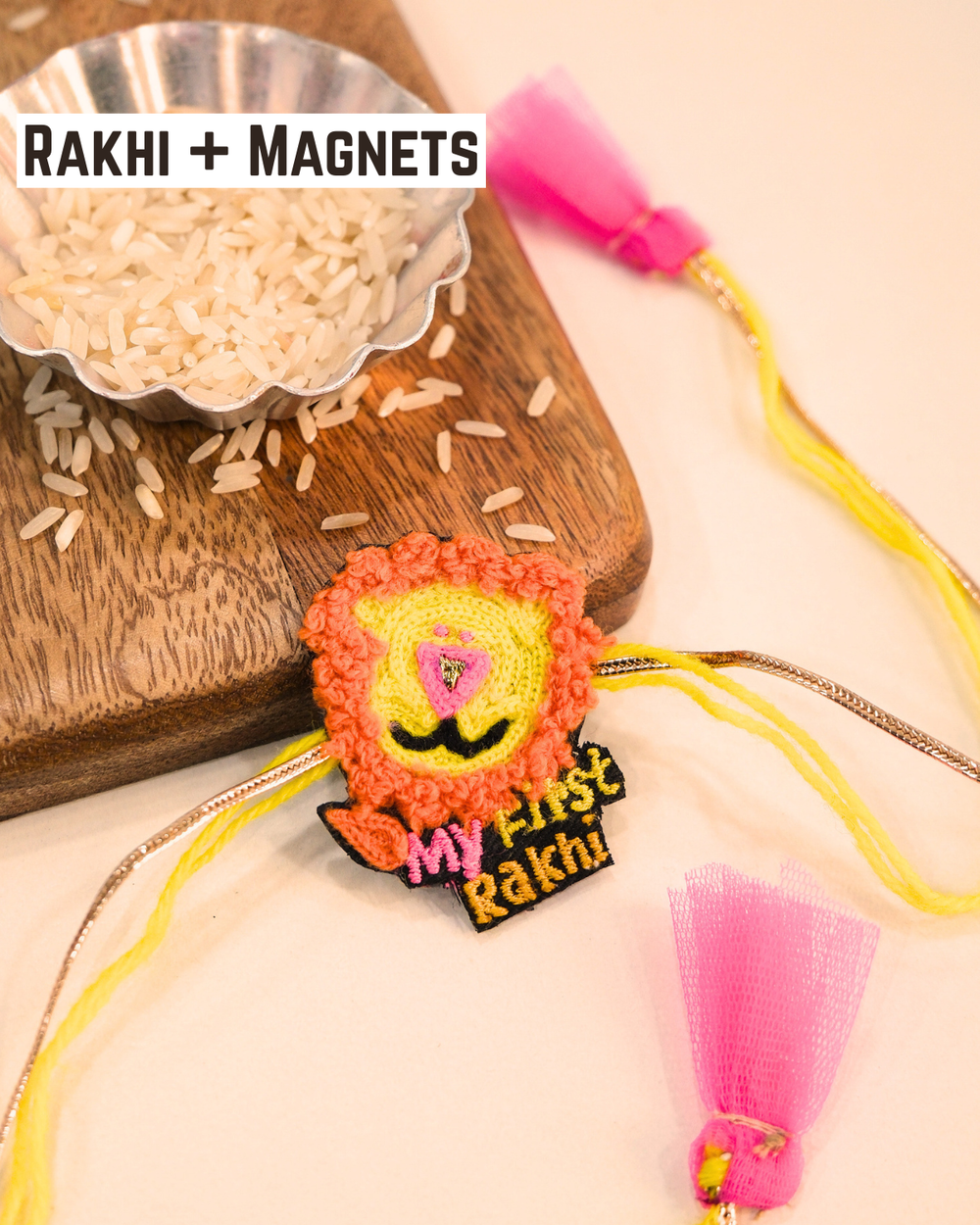Handcrafted my first Rakhi magnet displayed on a wooden board with colorful Rakhi threads, perfect keepsake for newborns and toddlers.