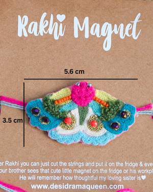 Close-up of Butterfly embroidered rakhi magnet on display card, showcasing handcrafted design and reusable keepsake fridge magnet.