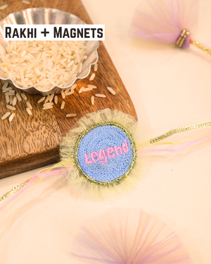 Legend Rakhi Magnet with soft embroidered design and colorful Rakhi thread, beautifully displayed as a meaningful Raksha Bandhan keepsake.
