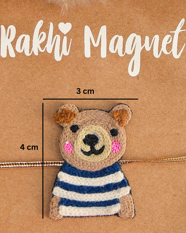 Close-up of Panda embroidered rakhi magnet on display card, showcasing handcrafted design and reusable keepsake fridge magnet.