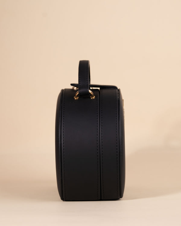 Embroidered black sling bag with lobster design, zari work, and gold trim finish