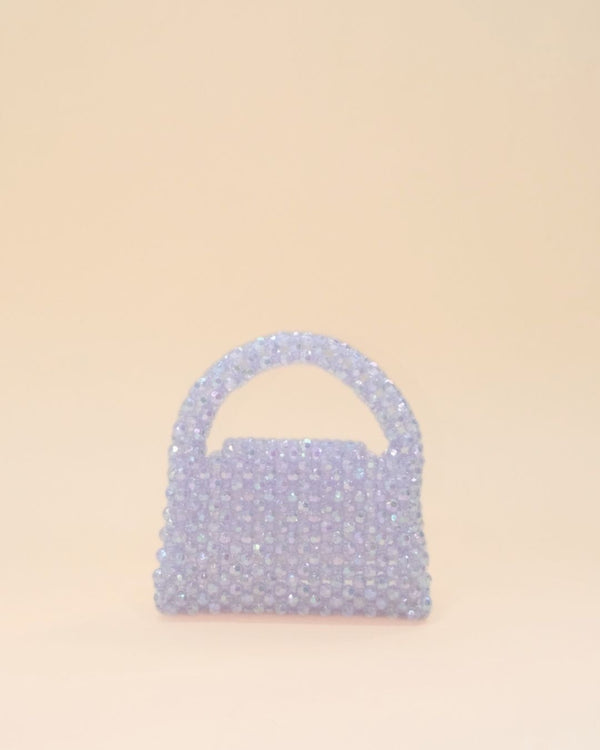 Stylish women’s mini tote bag made with multicolor rainbow beads, chic accessory