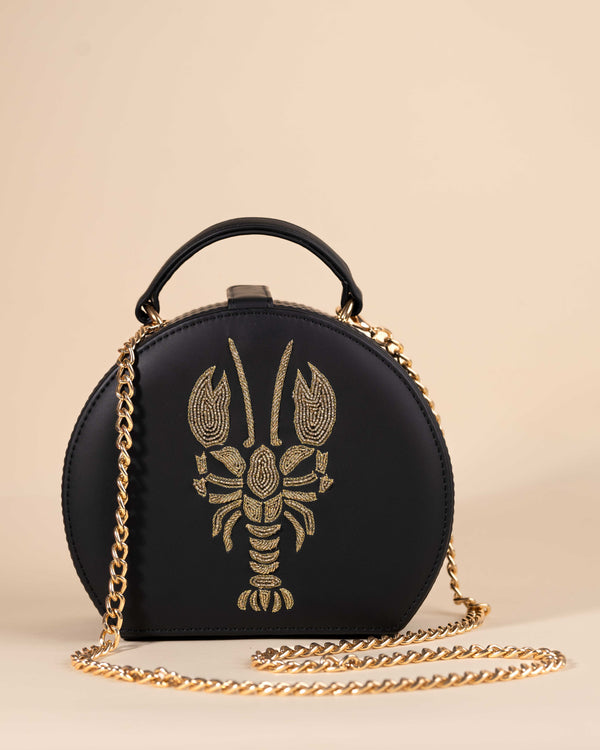 Elegant black sling with lobster embroidery in zari and bead embellishment