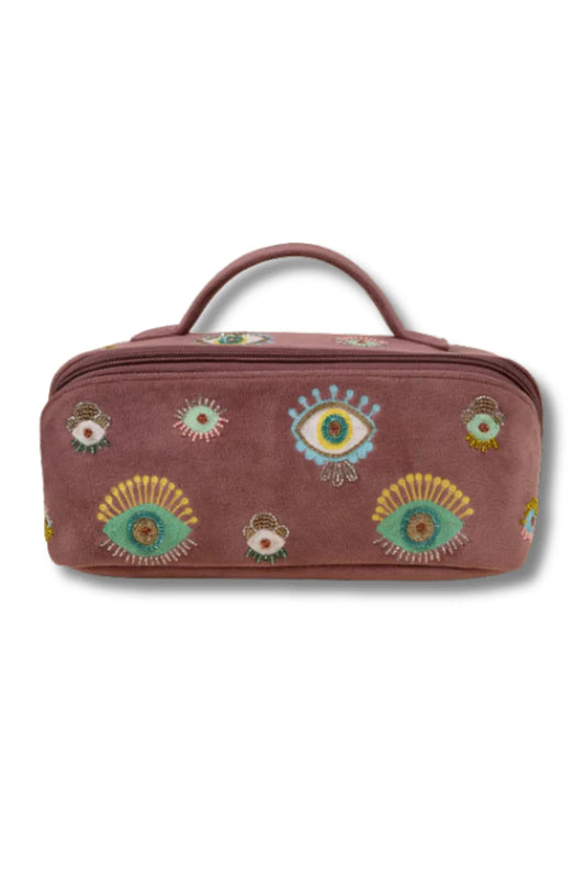 Peach cosmetic bag with evil eye designs 